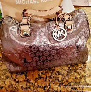 Authentic Michael Kors Silver Duffle bag